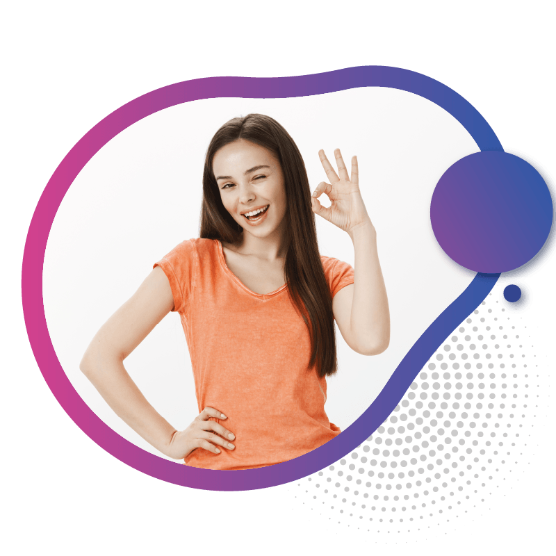 A woman in an orange shirt makes an 'OK' hand gesture, symbolizing the ease and convenience of seamless roaming with eSIM in Australia.